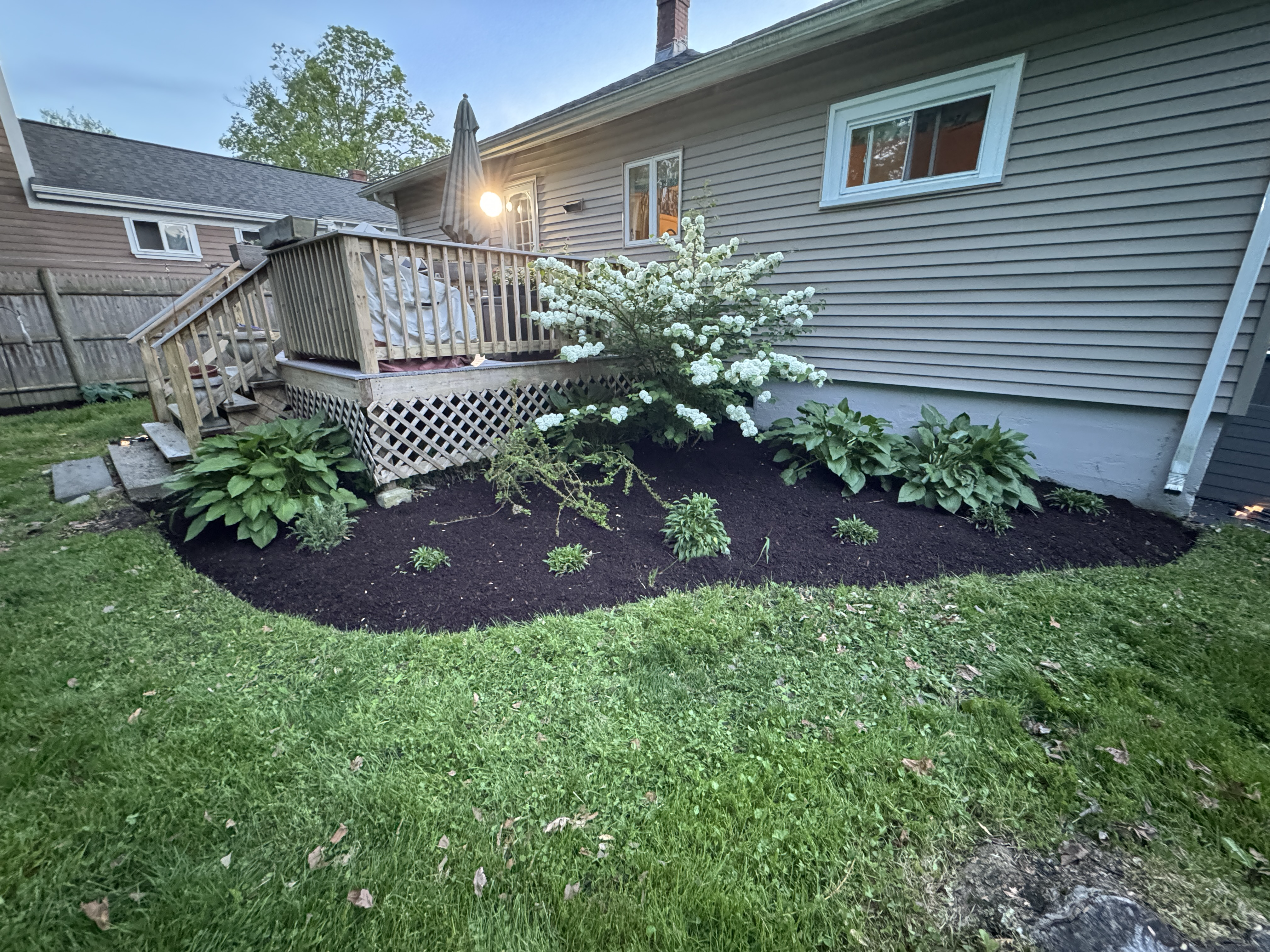 Front walkway with crisp mulched beds on both sides
