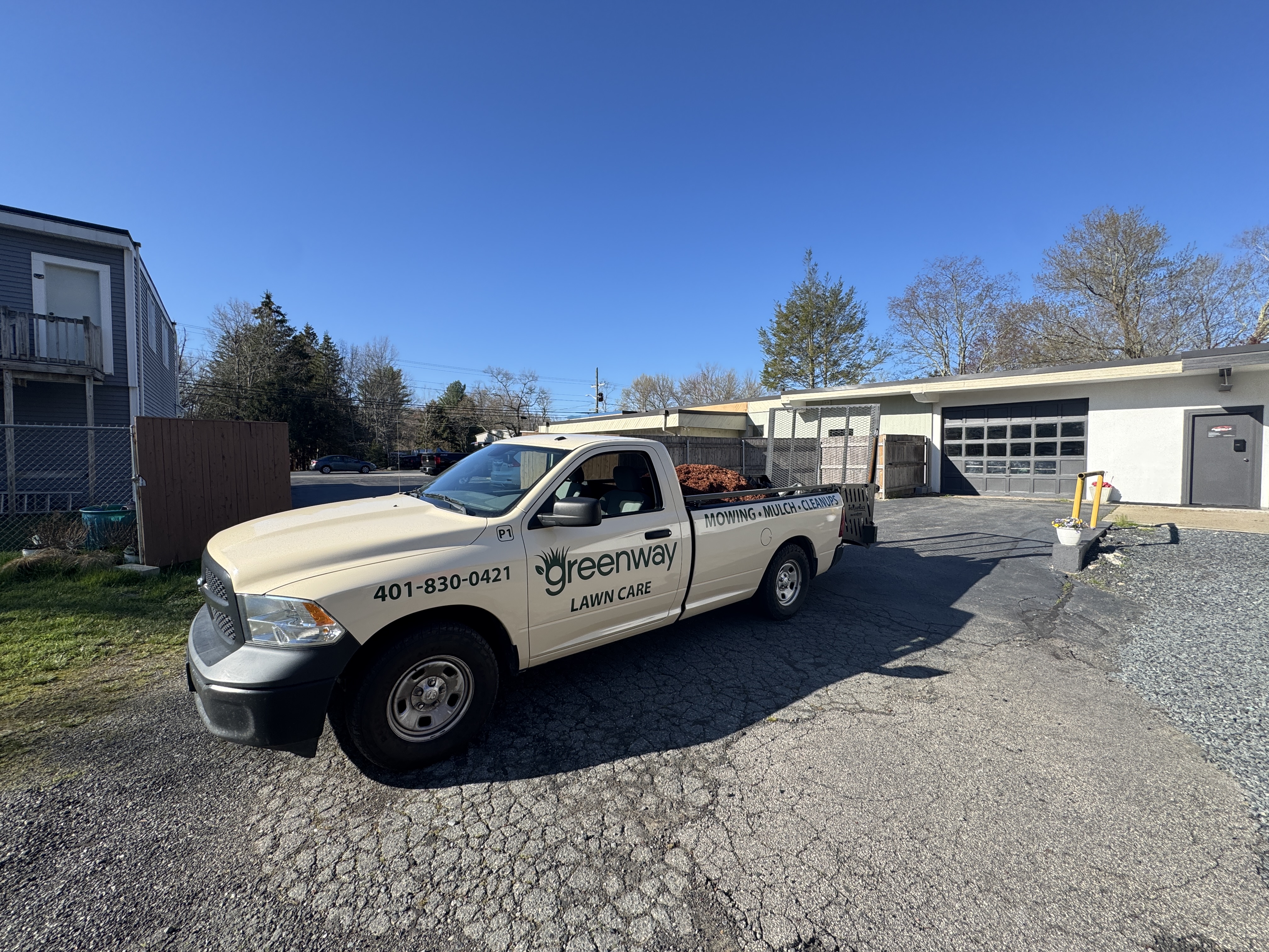 The Greenway truck loaded with mulch at the shop