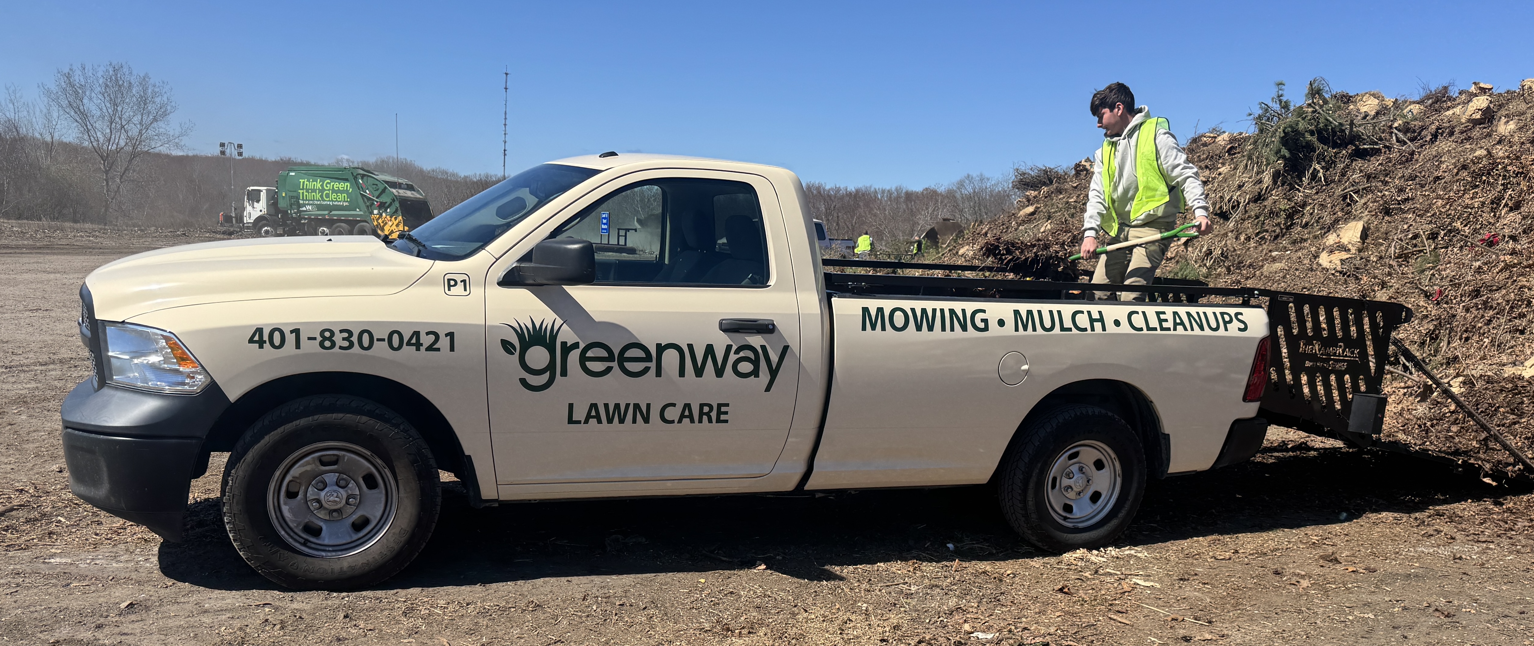 Greenway crew loading yard debris at the compost yard