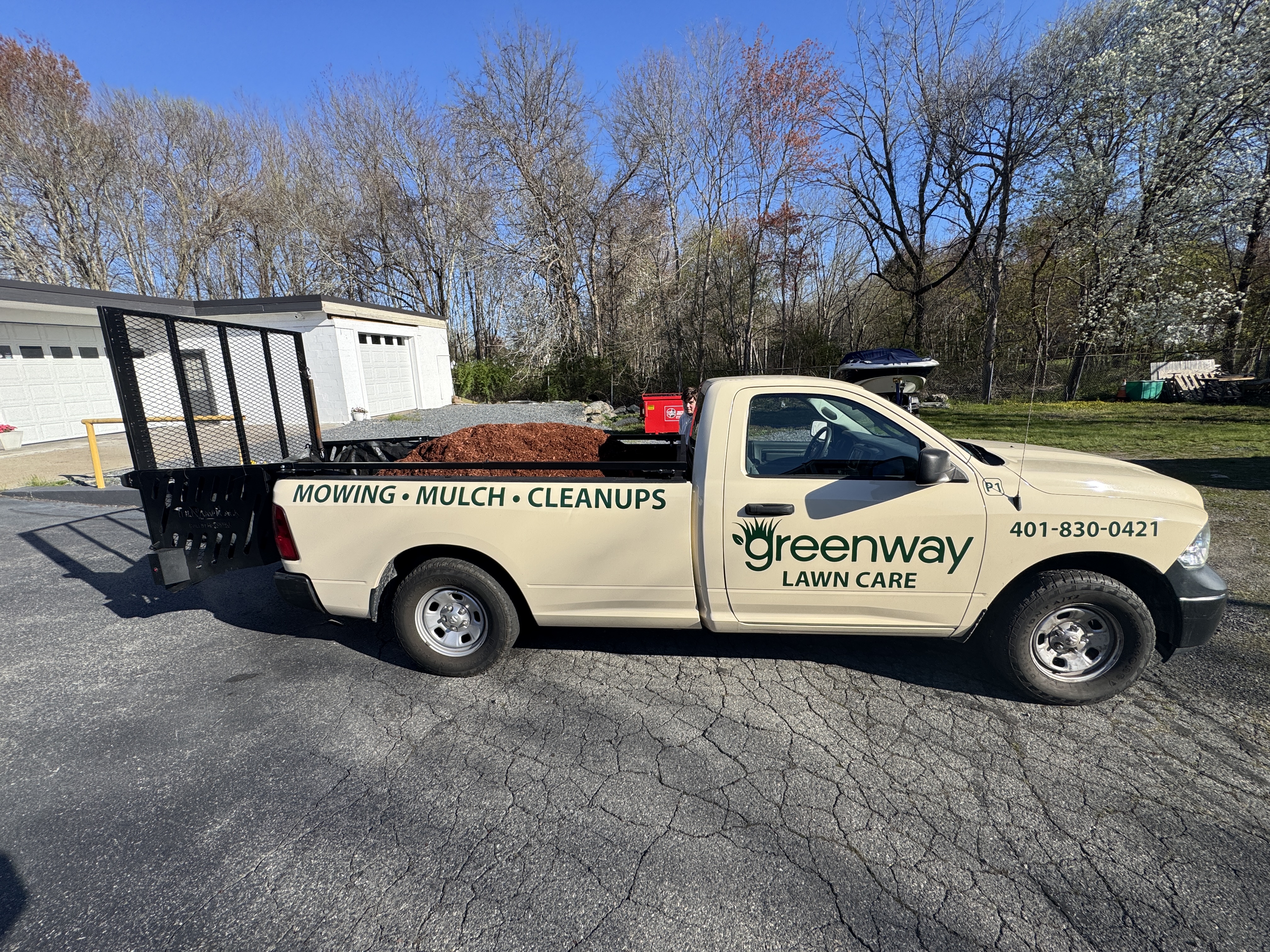 Greenway truck loaded with mulch at the shop